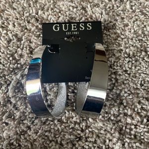 Guess sparkle large hoop hinge closure earrings. New with tags